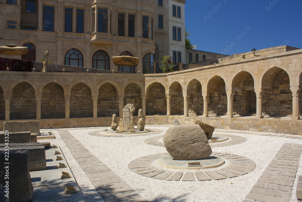 BAKU, AZERBAIJAN - JULY 8, 2017: Excavated archaeological ruins remains in palaces. Ancient tombs. Archaeological site. Arabic excavations. Archaeological excavation of the ancient building and tombs