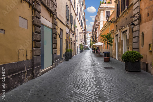 Narrow street in the historical centre of Rome, Italy © AlexAnton