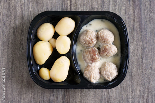 meatballs and potatoes microwavable instant ready meal or tv dinner, german dish known as Konigsberger Klopse photo