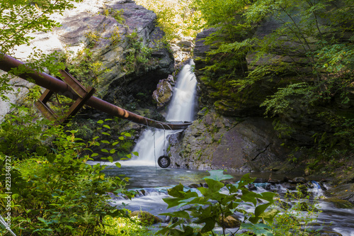 Swimming Hole At Bottom Of Waterfall With Tire Swing