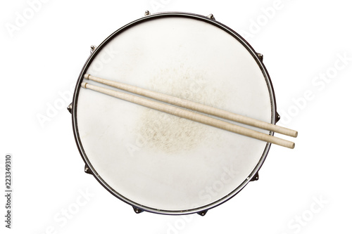 Snare drum with drumsticks top view isolated on white photo