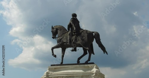 Side view of the horse statue of Gyula Andrassy, former prime minister in the late 1800s, at the Kossuth Square next to the Hungarian Parliament, the House of the National Assembly in Budapest. photo