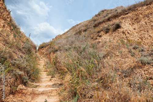 path near the high sea shore, beautiful coastal landscape, travel concept