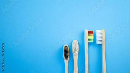 Black white and rainbow bamboo toothbrushes. Concept of racism  social exclusion  depression or loneliness  social problems or illegal migration