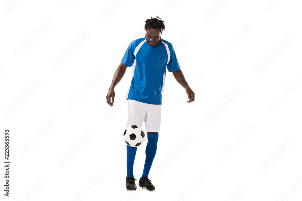sportive african american man in soccer uniform playing with ball isolated on white sportive african american man in soccer uniform playing with ball isolated on white