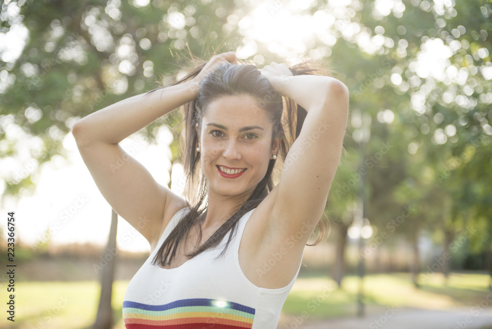 Pretty woman posing in the park