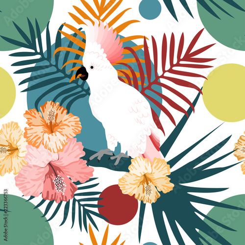 Tropical seamless pattern with colorful parrots flowers and leafs.Summer vector background.Textile texture