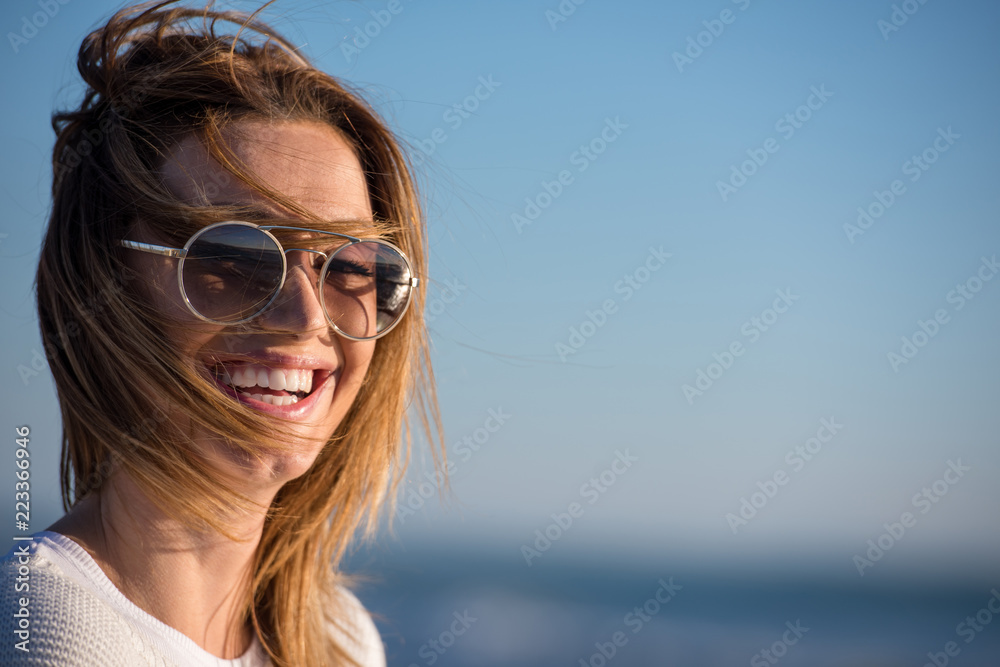 Young woman enjoying the warm autumn day Young woman enjoying the warm autumn day