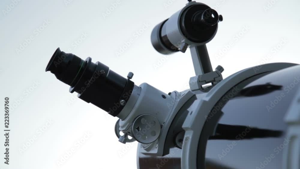Telescope on a evening / morning sky for searching stars and planets. Telescope on a evening / morning sky for searching stars and planets.