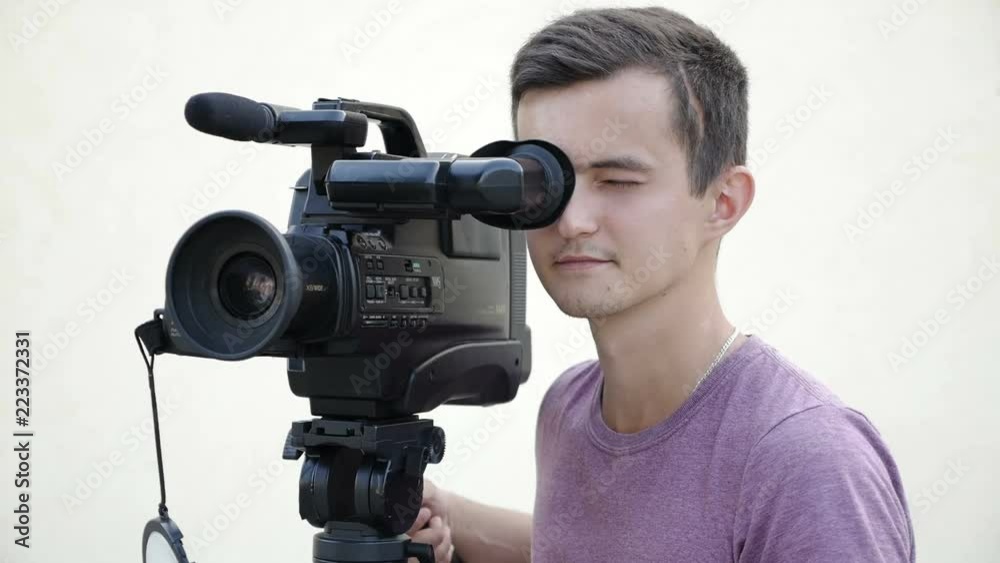 filmmaker takes video with professional tv camera filmmaker takes video with professional tv camera