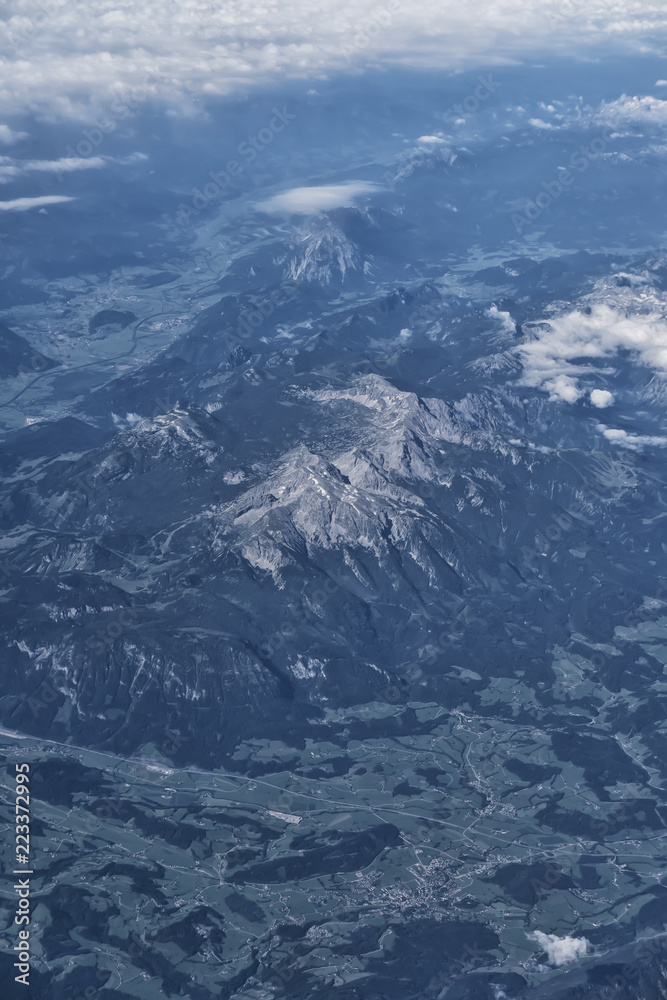 landscape view of the alps from the high up in the air
