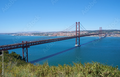 25 of April Bridge (Ponte 25 de Abril) – a suspension bridge over Tegus river. Lisbon. Portugal