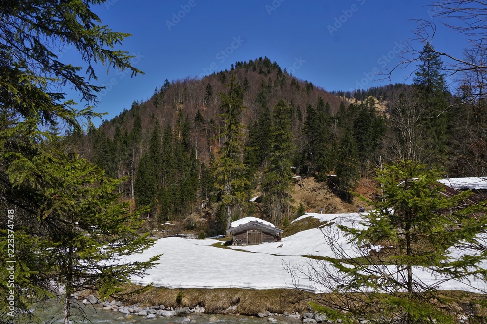 Hut in the mountains in Bavaria in the snow Hut in the mountains in Bavaria in the snow