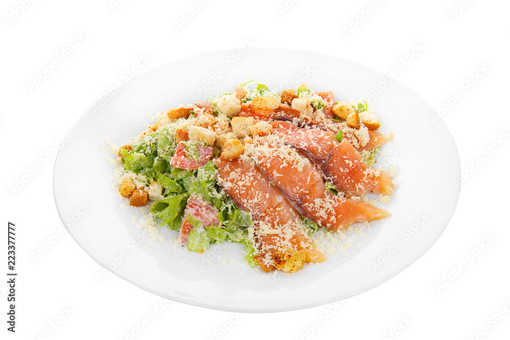 Caesar salad with fish lobes, salmon, trout, biscuits, tomato, lettuce, cheese on plate, white isolated background Side view. For the menu, restaurant bar cafe Caesar salad with fish lobes, salmon, trout, biscuits, tomato, lettuce, cheese on plate, white isolated background Side view. For the menu, restaurant bar cafe