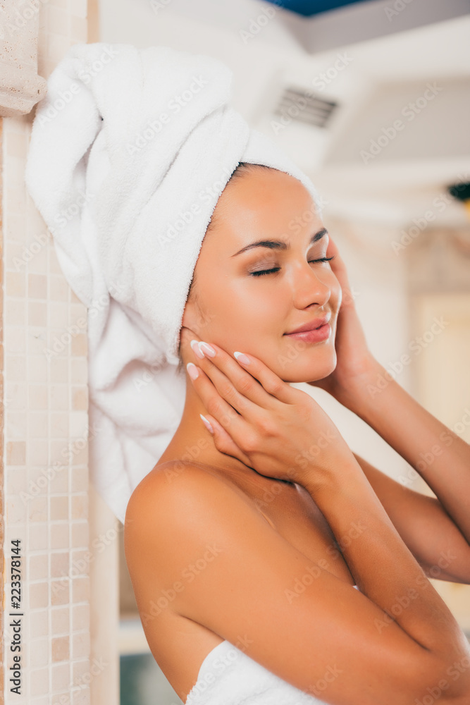 beautiful woman in white bath robe with perfect clean face beautiful woman in white bath robe with perfect clean face