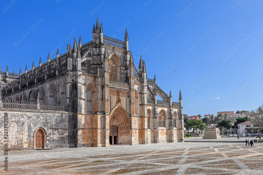 Batalha, Portugal. Monastery of Batalha aka Santa Maria da Vitoria Abbey. Facade with Portal in Gothic and Manuelino aka Manueline style