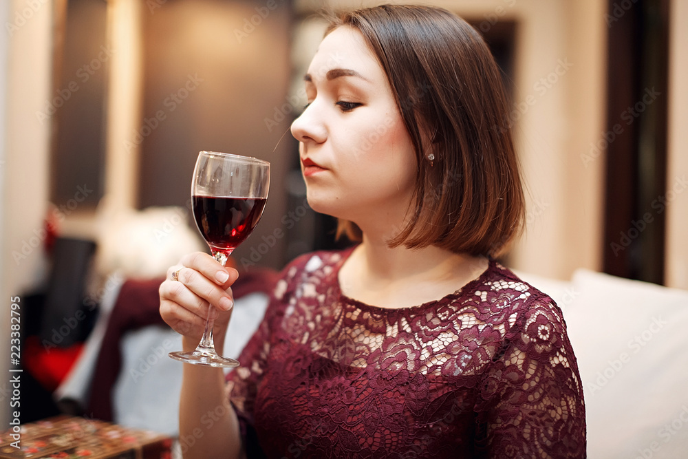 Portrait of a gorgeous young brunette woman having wine fun. Portrait of a gorgeous young brunette woman having wine fun.