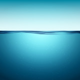 Underwater ocean surface. Blue water background. Clean nature sea underwater backdrop