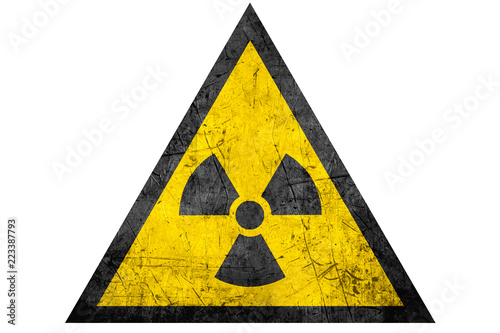 black radioactive sign in yellow riangle
