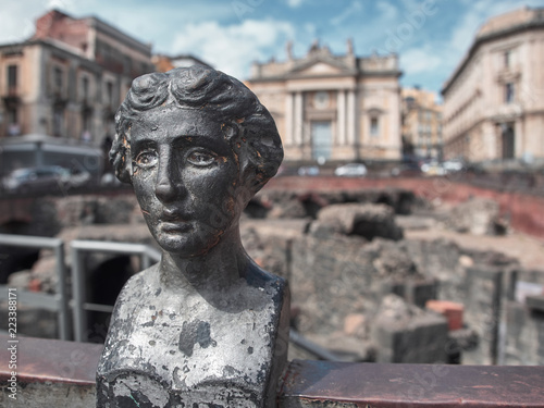 Shot of the Roman Anphitheater in Piazza Stesicoro in Catania in a summer day. Catania, Sicily photo