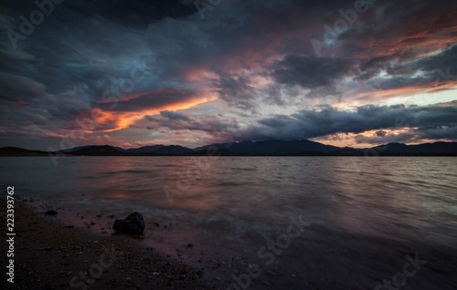 Sunset at a reservoir in Thailand.