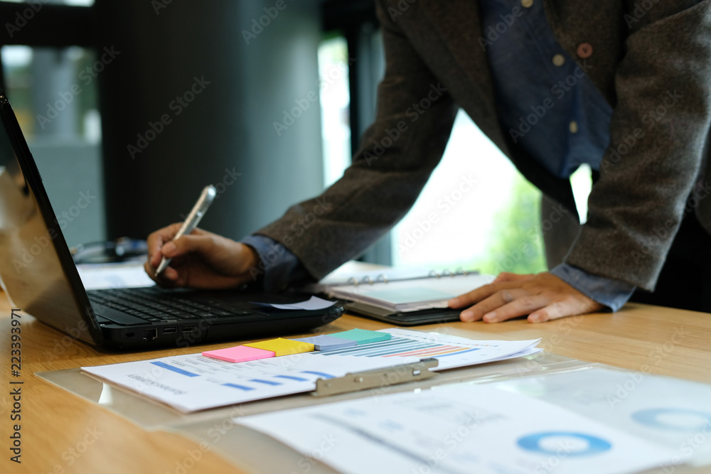 man organizeing plan. businessman working with computer at workplace man organizeing plan. businessman working with computer at workplace
