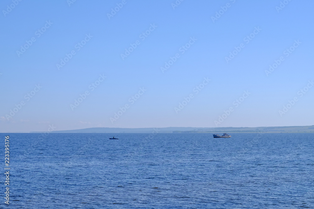 Landscape, two fishing boats fishing in the sea Landscape, two fishing boats fishing in the sea