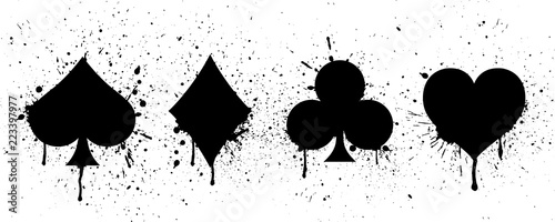 The suits of the deck of playing cards on background of splashing. Vector illustration. photo