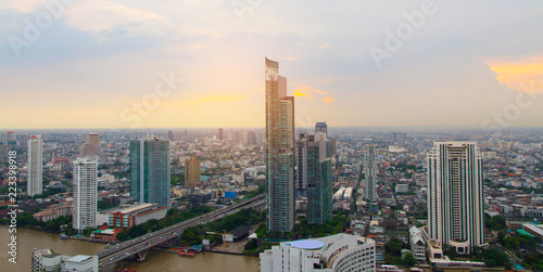 Panorama top view Bangkok city skyline with sunset 