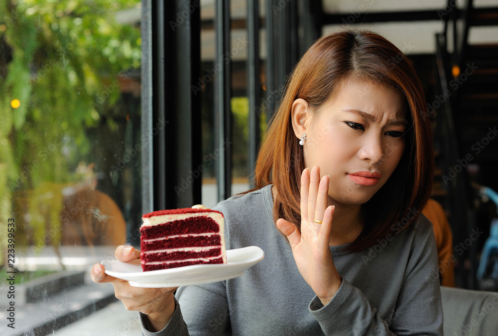 custom made wallpaper toronto digitalAsian girl refuses cake because she is controlling her calories,Dieting,Cake is heigh calories for dieting women,Women don't like cake