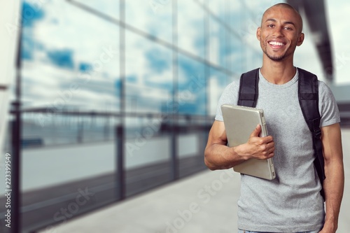 Young man student with book © BillionPhotos.com
