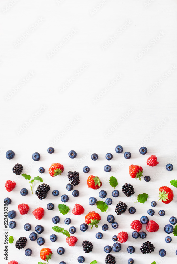 assorted berries over white background. blueberry, strawberry, raspberry, blackberry assorted berries over white background. blueberry, strawberry, raspberry, blackberry
