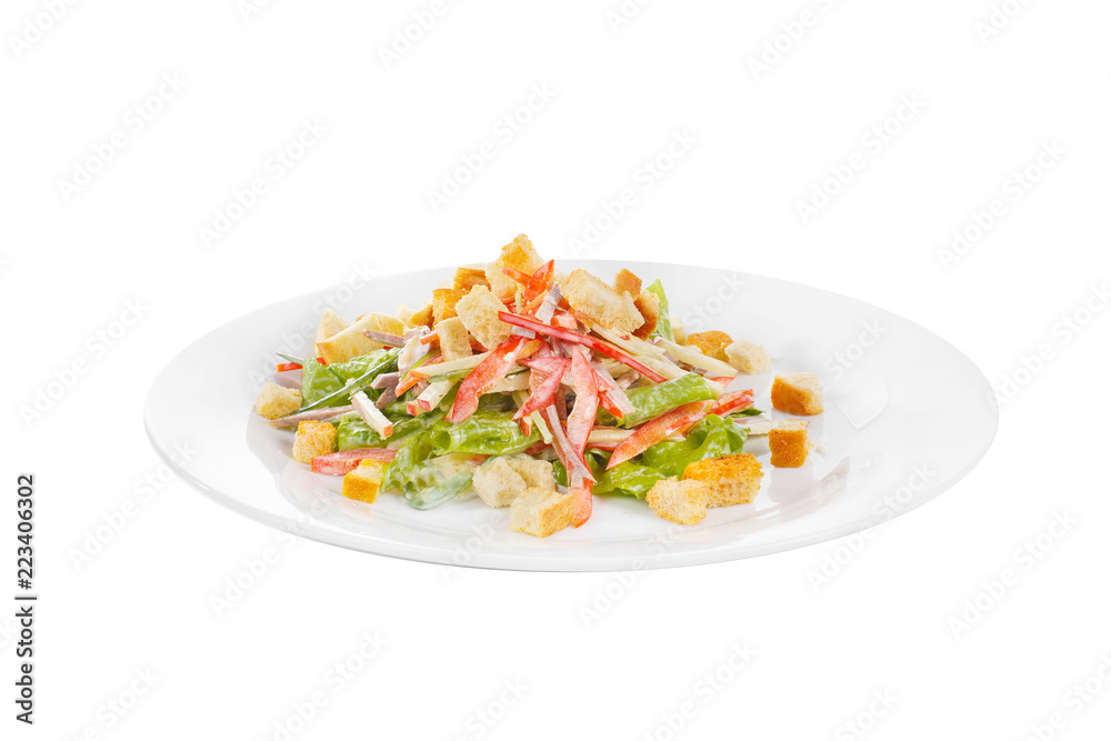 Caesar salad with meat, beef, chicken, pepper, rusks, lettuce, apple on plate, white isolated background Side view. For the menu, restaurant bar cafe