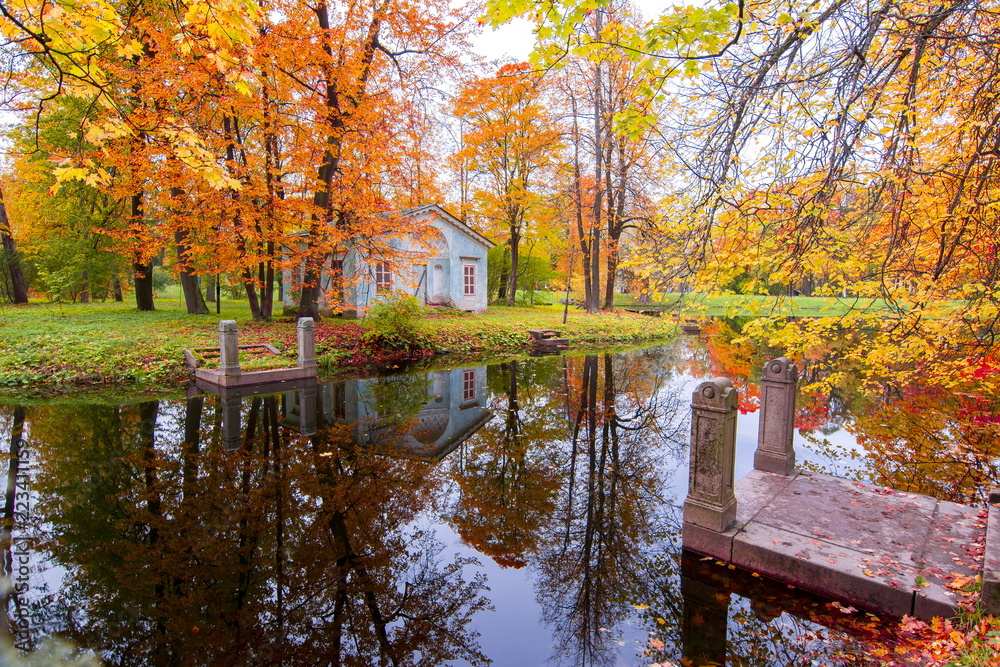 Children's house in autumn foliage in Alexander park, Tsarskoe Selo (Pushkin), St. Petersburg, Russia Children's house in autumn foliage in Alexander park, Tsarskoe Selo (Pushkin), St. Petersburg, Russia