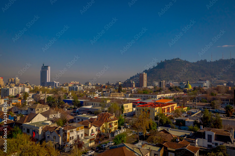 SANTIAGO, CHILE - SEPTEMBER 13, 2018: Outdoor view of Skyline of Santiago de Chile at the foots of The Andes Mountain Range and buildings at Providencia district
