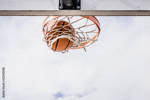Scoring Basket Falling Through the Net