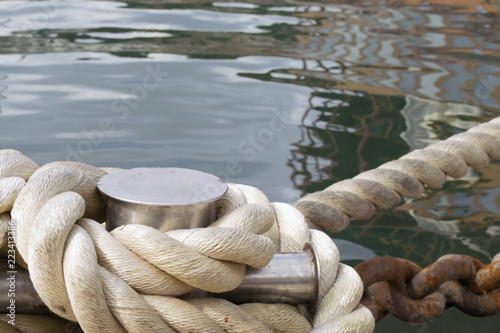 the ship is tied with a mooring rope