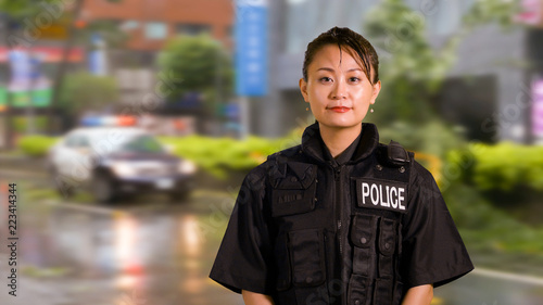 Asian American Woman Police Officer at Crime scene