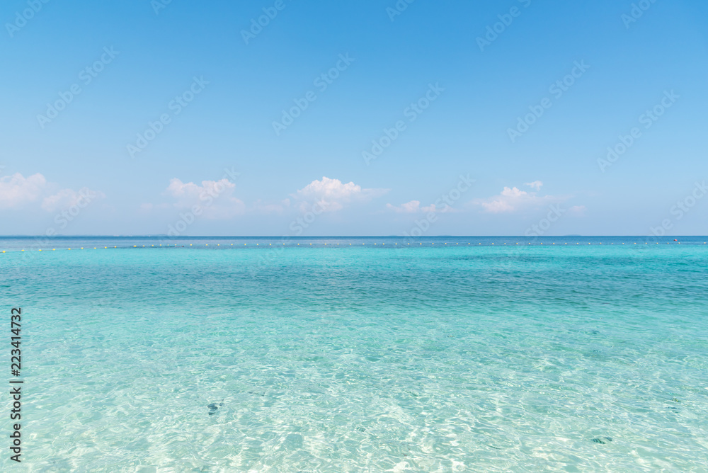 Beautiful white sand on Tropical beach blue water and blue sky