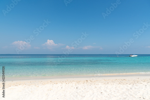 Beautiful white sand on Tropical beach blue water and blue sky