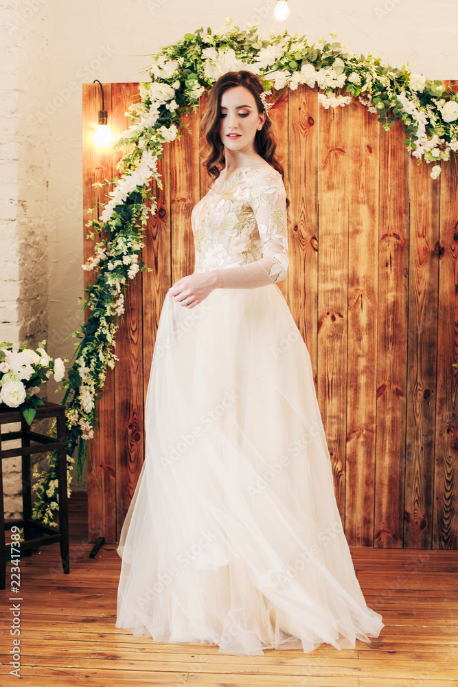 Fototapeta premium beautiful bride in a chic wedding dress