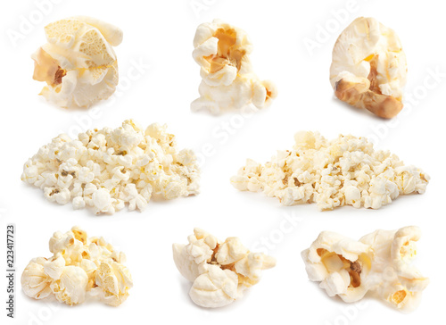 Set with delicious popcorn on white background