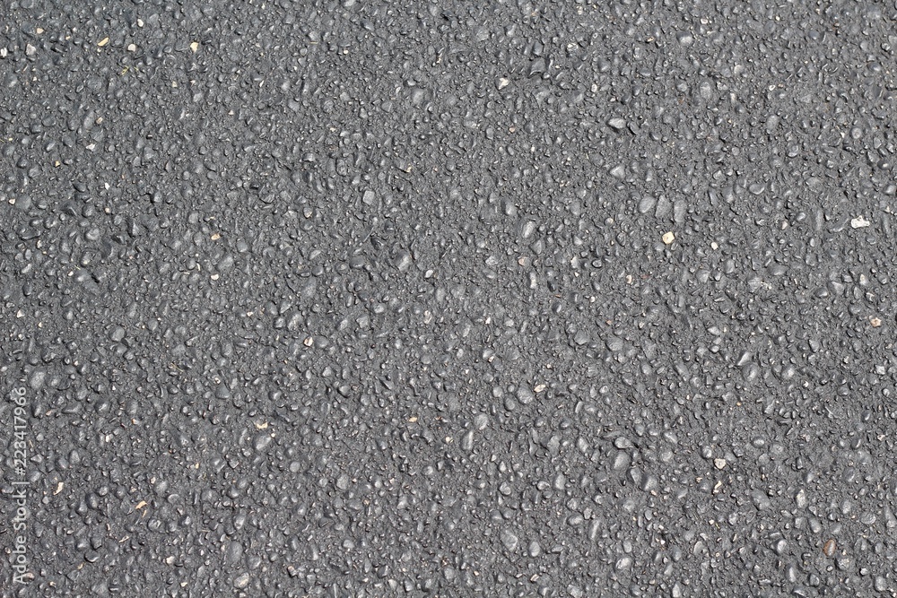 A close view on the blacktop pavement texture surface. A close view on the blacktop pavement texture surface.