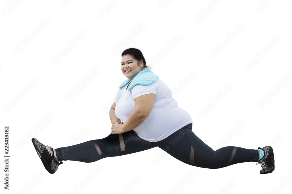 Asian obese woman doing split exercise Asian obese woman doing split exercise