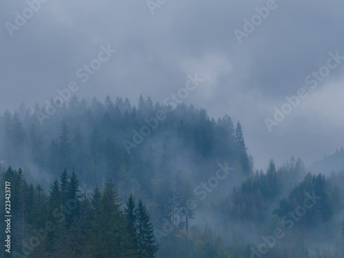 The Carpathian mountains landscape during mist in the autumn season © thaarey1986