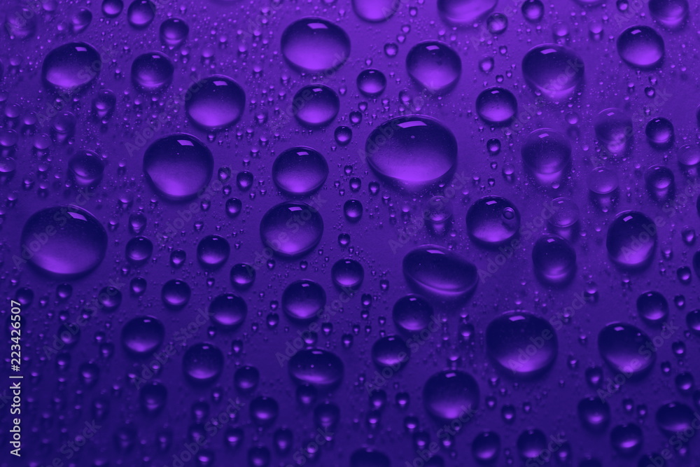 water drops on blue violet color background texture water drops on blue violet color background texture