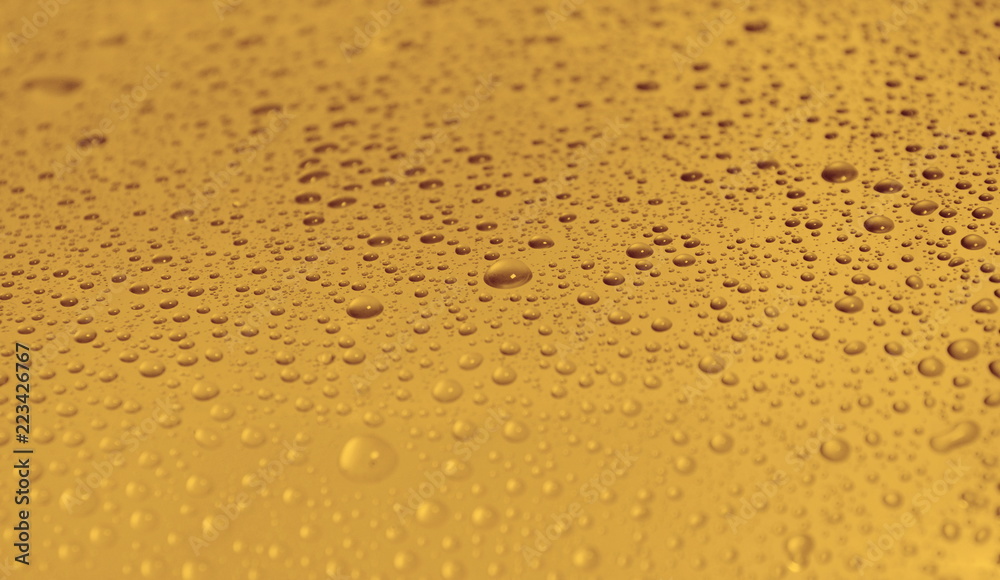 natural water drops on yellow golden background texture natural water drops on yellow golden background texture