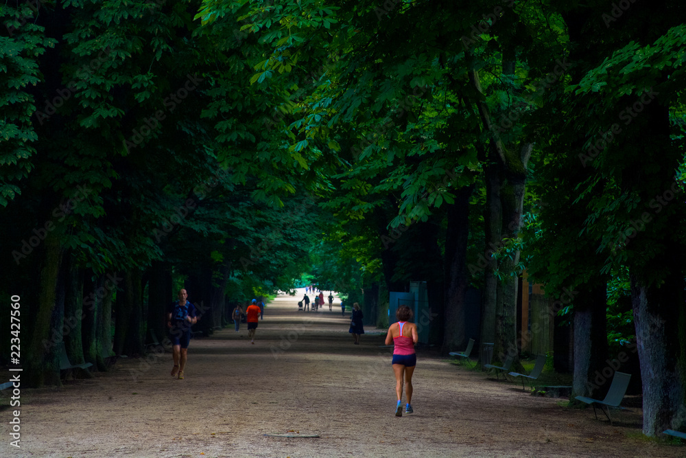Joggers in Paris Public Park