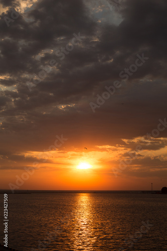 dawn overlooking the sea and the horizon in the summer in the port of Odessa © Вадим Михеев