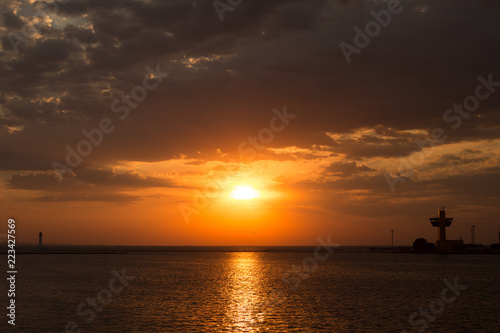 dawn overlooking the sea and the horizon in the summer in the port of Odessa